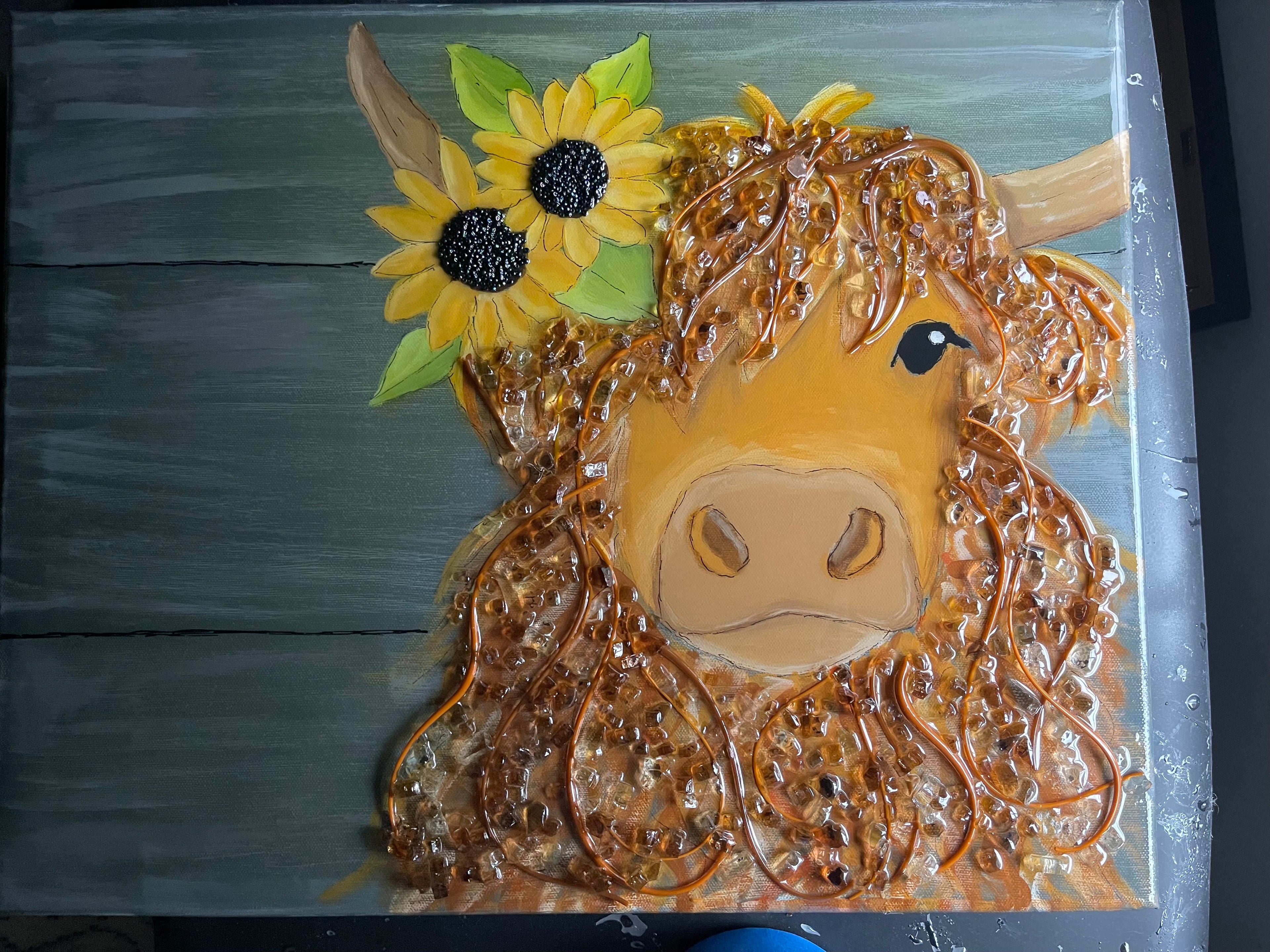 highland cow with flowers